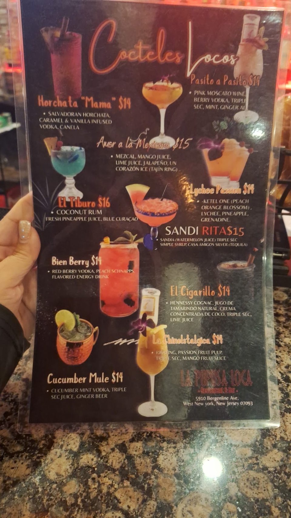 Printed menu showing batidos and hot drinks.